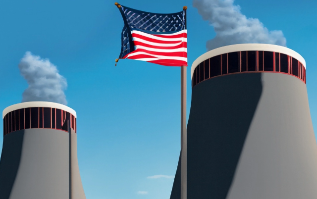 Nuclear cooling towers with a flag in front.